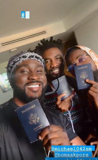 Pere, Boma And Michael Show Off Their Blue Passports As They Fly To Dubai