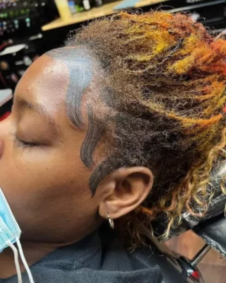Woman goes viral after tattooing ‘baby hair’ to her forehead (photos)