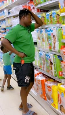 Man breaks down after seeing the price of diapers at a shopping mall in Benin